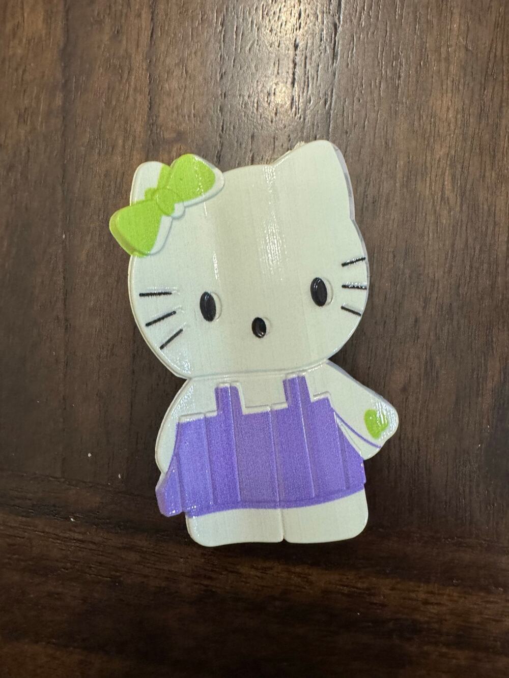 Large Hello Kitty hair clip claw with green bow and purple dress #kawaii